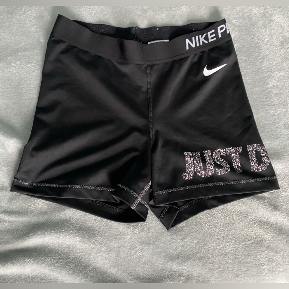 Nike spandex shorts size M black and white.